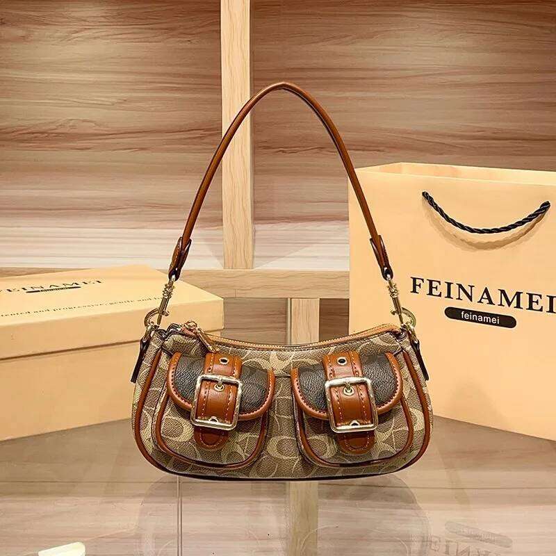 Light luxury French stick 2025 new underarm single shoulder crossbody bag, fashionable contrasting color motorcycle bag