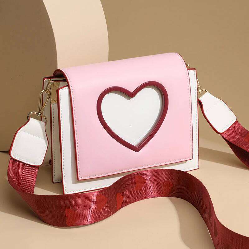 Lady's heart-shaped flip-top crossbody bag with shoulder strap