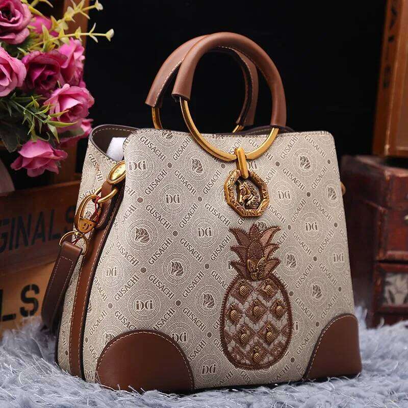 Brand designer handbag retro bucket women's 2025 new autumn and winter high-end printed shoulder crossbody bag