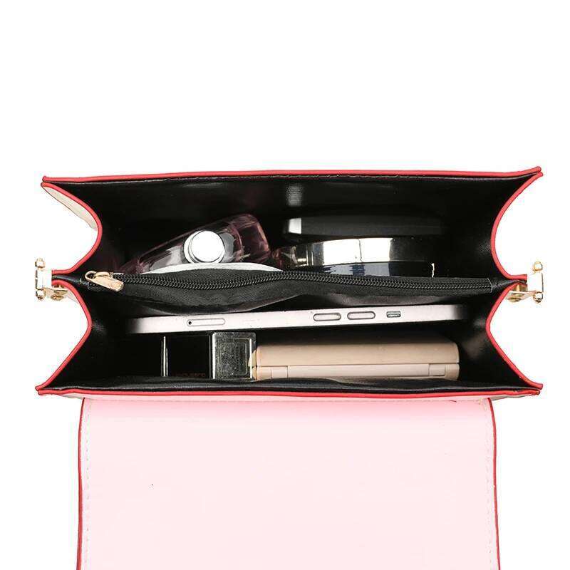 Lady's heart-shaped flip-top crossbody bag with shoulder strap