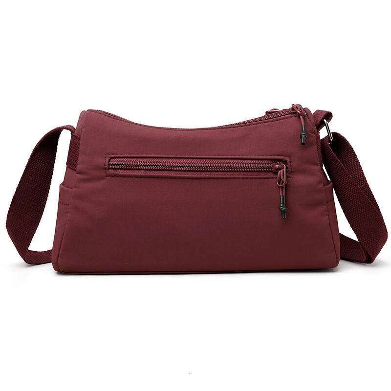Foreign trade new shoulder lightweight simple fashion portable commuter multi-compartment outdoor crossbody shopping bag