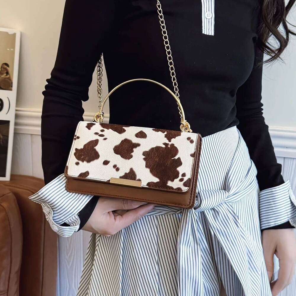 Ladies' cow print hand-held bag, crossbody with detachable chain, fashionable women's bag H260131
