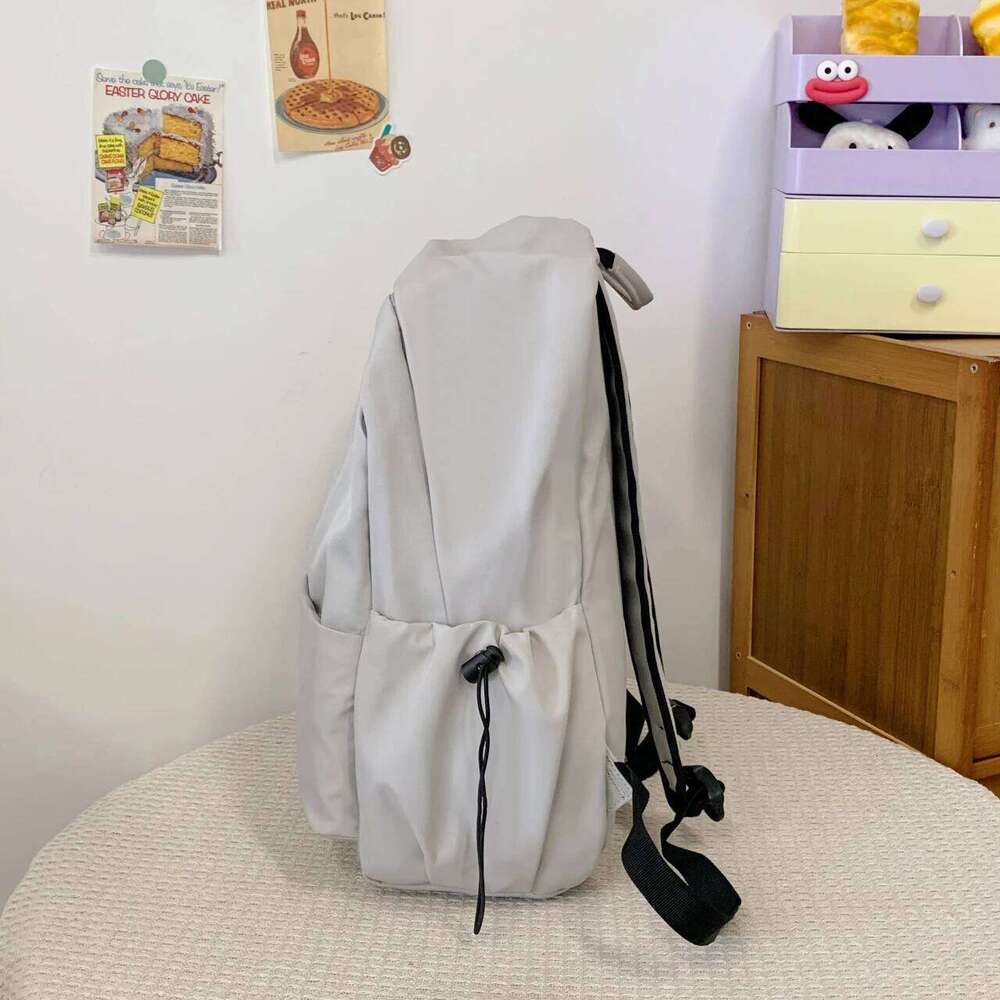 Korean-style large-capacity solid-color backpack girls Korean version, versatile bag for boys high school size, d