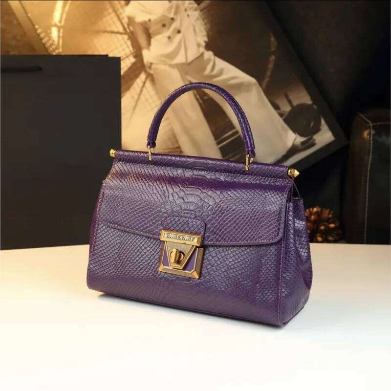 KB Fashion Women's New 2025 Light Luxury Premium Serpentine Lock Heavy Industry Single Shoulder Handbag Double sided Bag