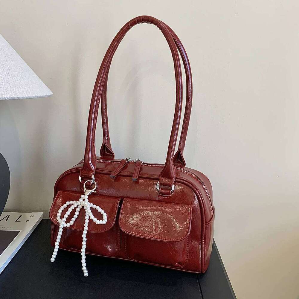 Simple casual bow tie armpit bag ladies, new Korean version for 2024; fashionable and versatile single shoulder bag.