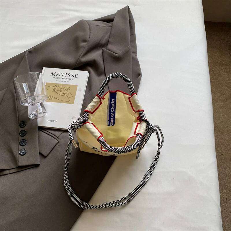 Embroidered canvas women; light single shoulder bag for spring and summer; cross-body handbag.