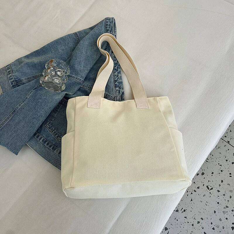 Commuting large capacity single shoulder canvas bag, women's Korean version versatile hand-held tote bag