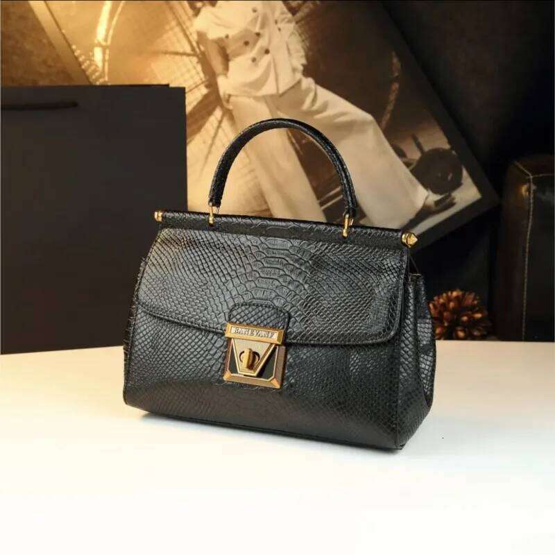 KB Fashion Women's New 2025 Light Luxury Premium Serpentine Lock Heavy Industry Single Shoulder Handbag Double sided Bag