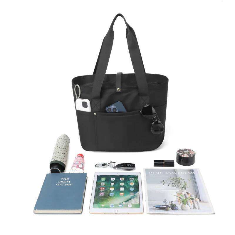 Women's portable folding storage bag with multiple compartments and adjustable shoulder strap for large capacity.