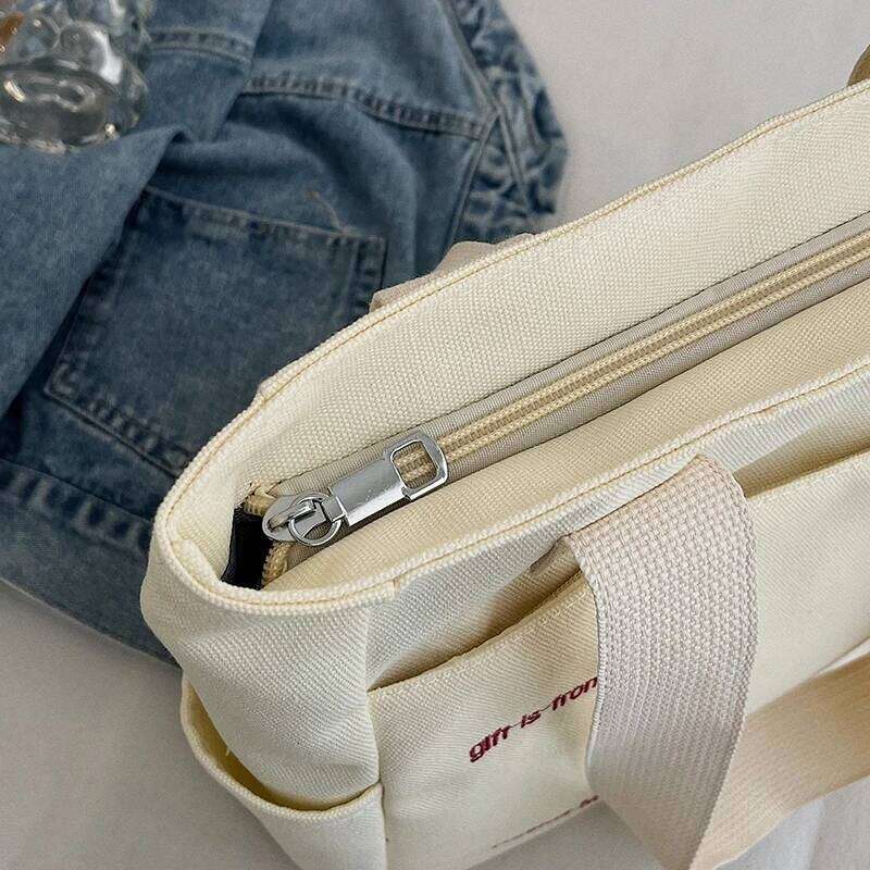 Commuting large capacity single shoulder canvas bag, women's Korean version versatile hand-held tote bag