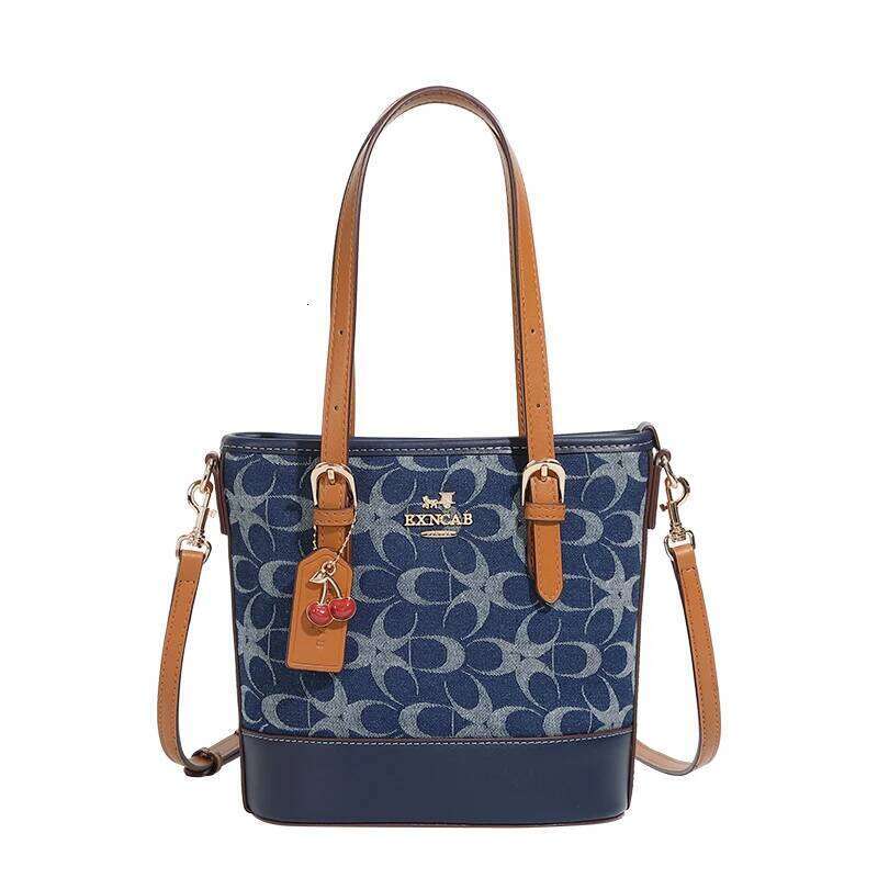 Brand denim hand-held bucket women's 2025 new fashionable and versatile shoulder bag, temperament commuting crossbo
