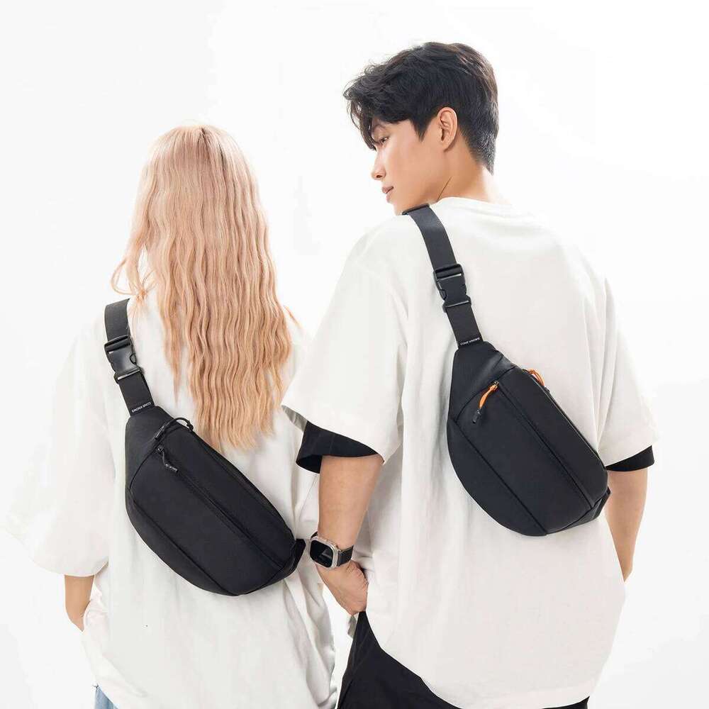 Japanese-style canvas versatile casual small 2025 new model student simple cross-body outdoor men's chest bag wais