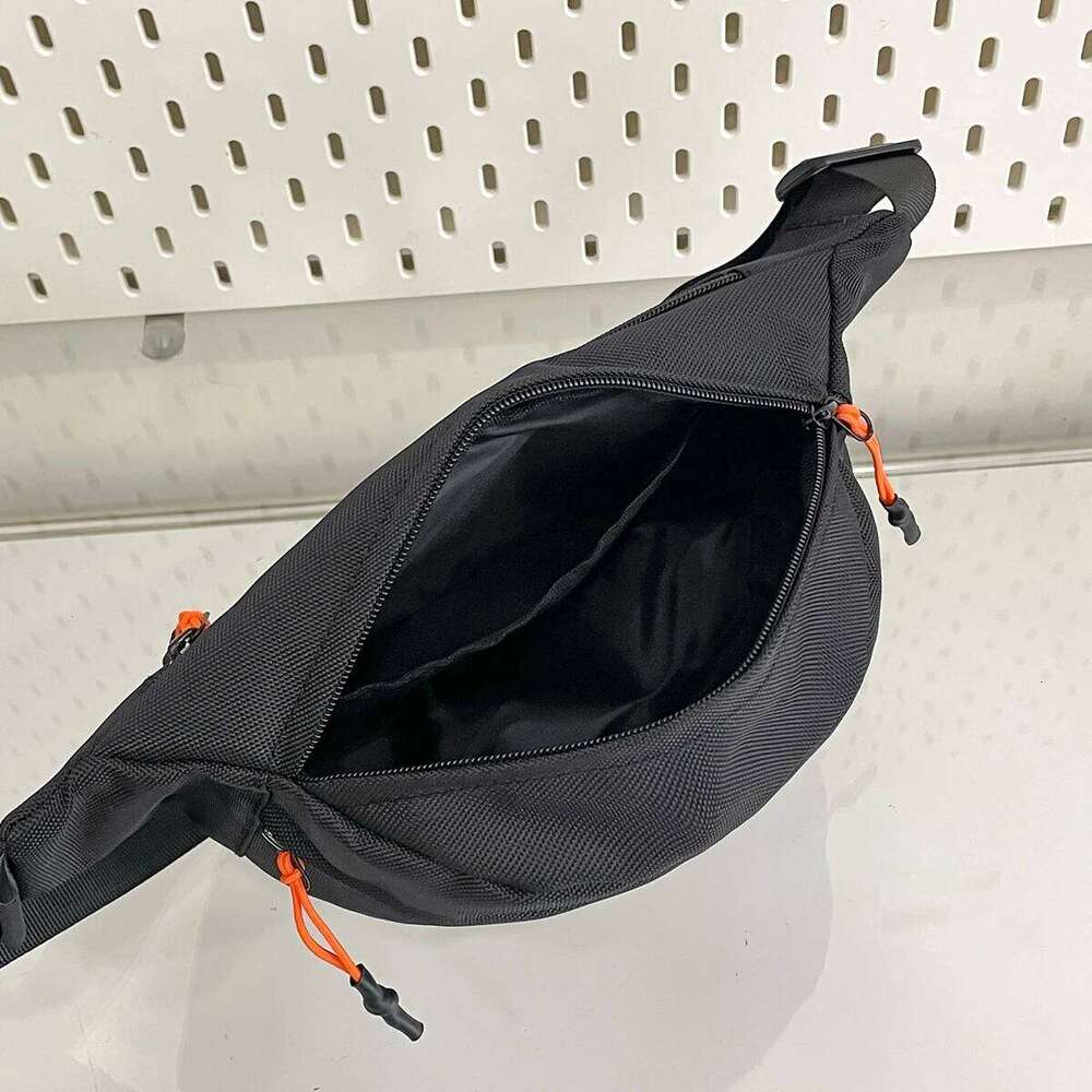 Japanese-style canvas versatile casual small 2025 new model student simple cross-body outdoor men's chest bag wais