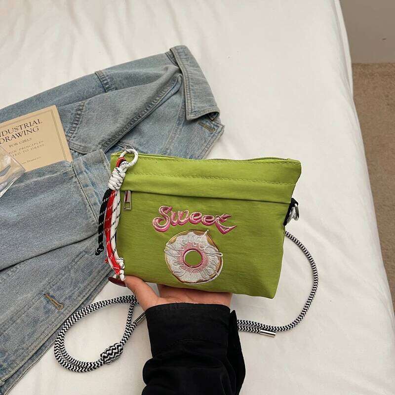 Japanese-style embroidered shoulder bag for women with unique design, large capacity, and a slanted cross-body style, small sq