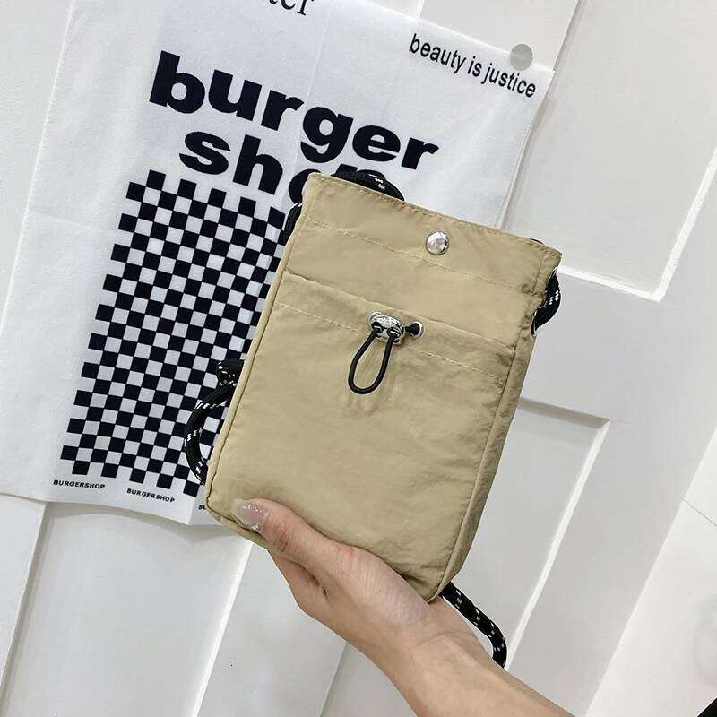 Japanese nylon small shoulder solid color vertical version mobile phone casual simple coin purse headphone bag