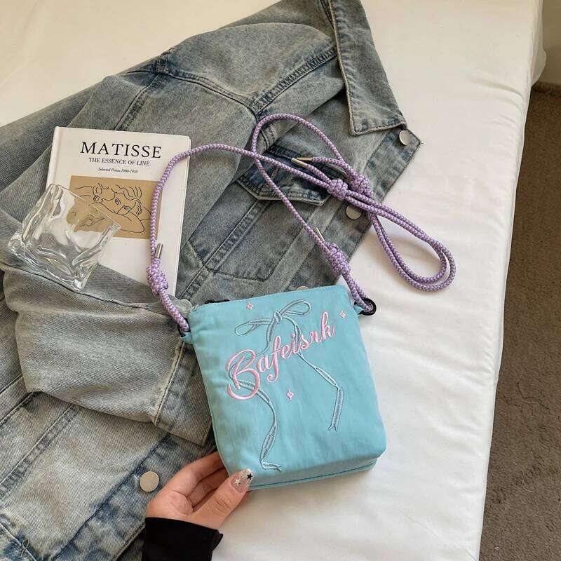 Bow embroidered crossbody bag for women, 2025 new ins niche mobile phone coin purse commuting shoulder bag.
