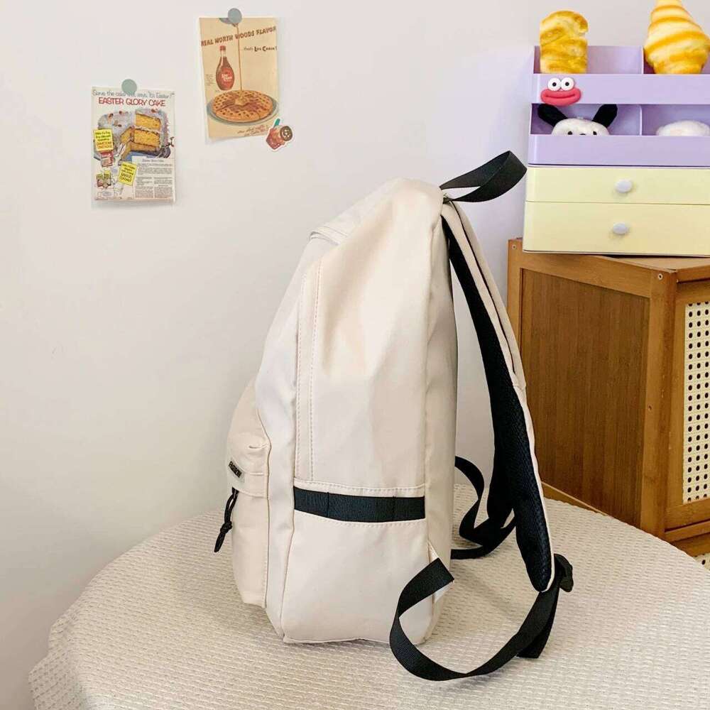 Korean-style large-capacity solid-color backpack girls Korean version, versatile bag for boys high school size, d