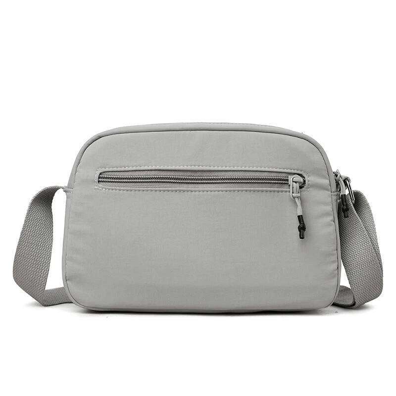 New Korean version macaron colored nylon cloth versatile travel small square crossbody shoulder women's bag