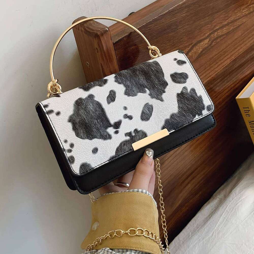 Ladies' cow print hand-held bag, crossbody with detachable chain, fashionable women's bag H260131