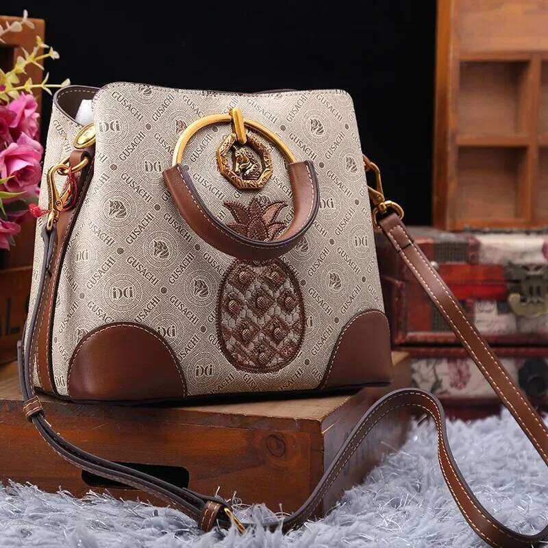 Brand designer handbag retro bucket women's 2025 new autumn and winter high-end printed shoulder crossbody bag