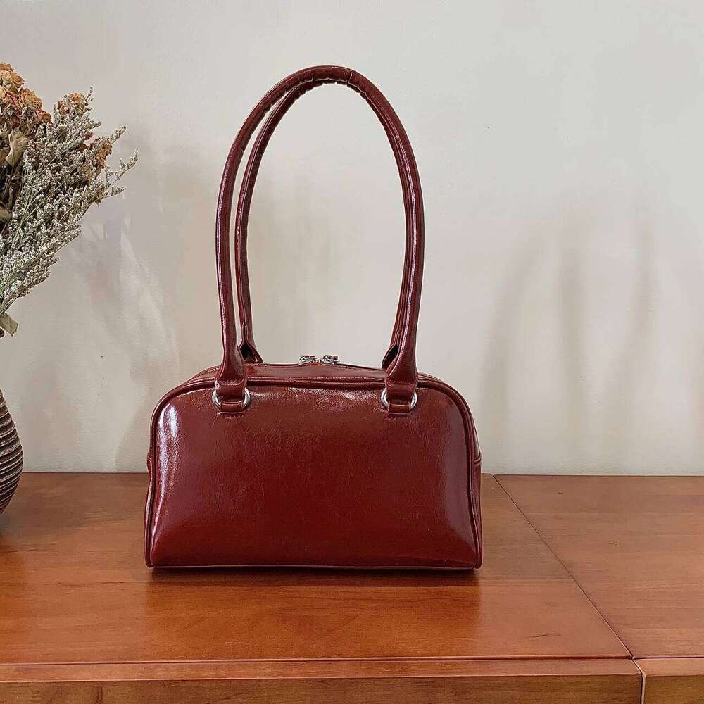 Simple casual bow tie armpit bag ladies, new Korean version for 2024; fashionable and versatile single shoulder bag.