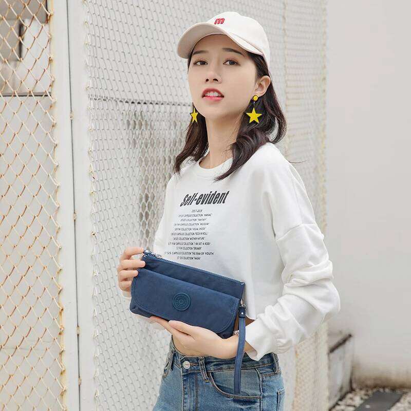 Women's shoulder Bag 2023 New high quality portable nylon Fashion small tote purse mobile phone Sling bag waterproo 8102