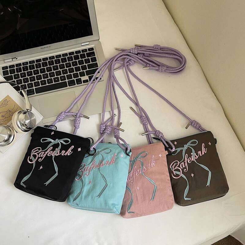 Bow embroidered crossbody bag for women, 2025 new ins niche mobile phone coin purse commuting shoulder bag.