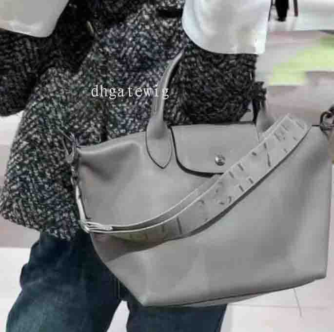 designer long bag large zipped handbag leather shopper dumpling crossbody bag top handle commuter traveling bag luxury french style fashion bag