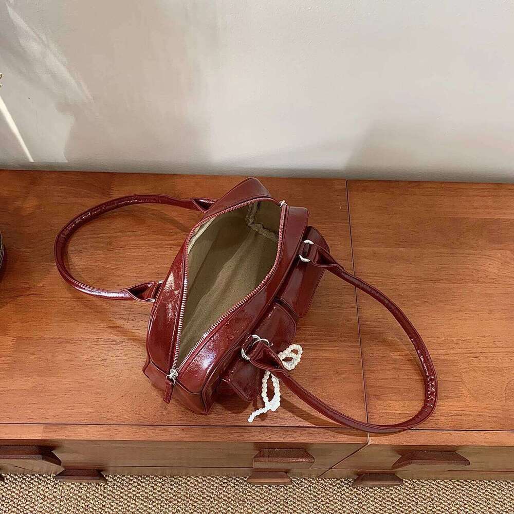 Simple casual bow tie armpit bag ladies, new Korean version for 2024; fashionable and versatile single shoulder bag.