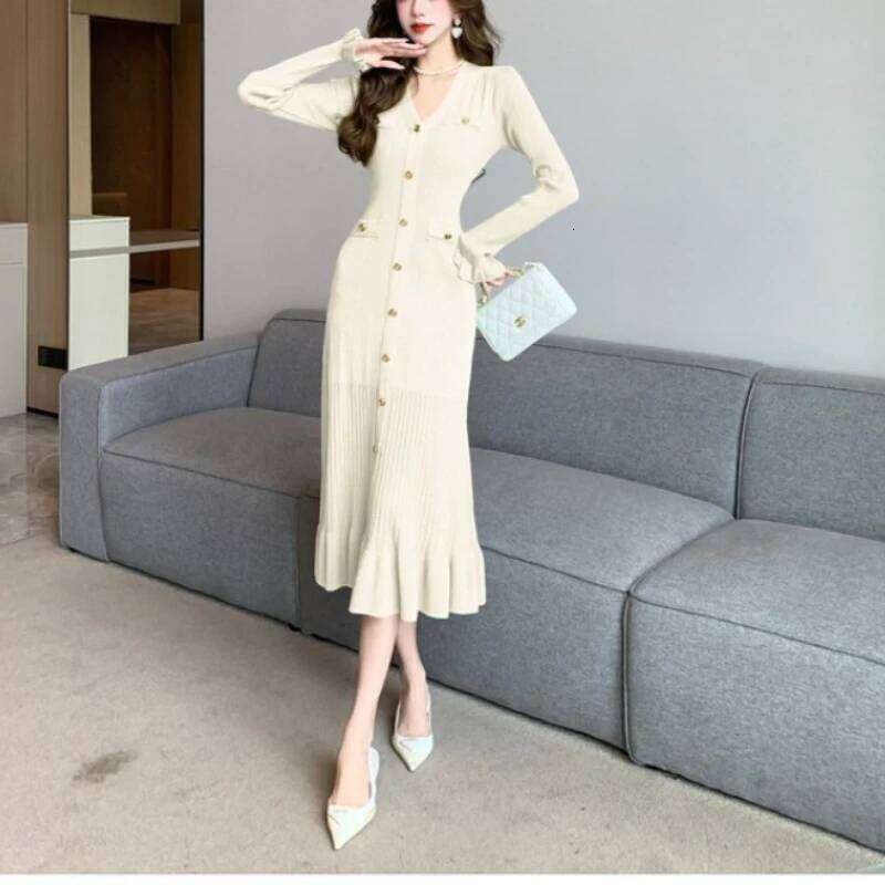 Solid Color Temperament Ruffle Edge Autumn Winter New Women's V-neck Button Long-sleeved Fishtail Knitted Fitted Dress XJ260131