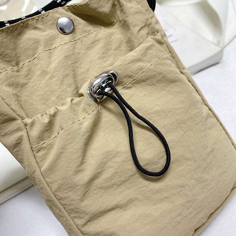 Japanese nylon small shoulder solid color vertical version mobile phone casual simple coin purse headphone bag