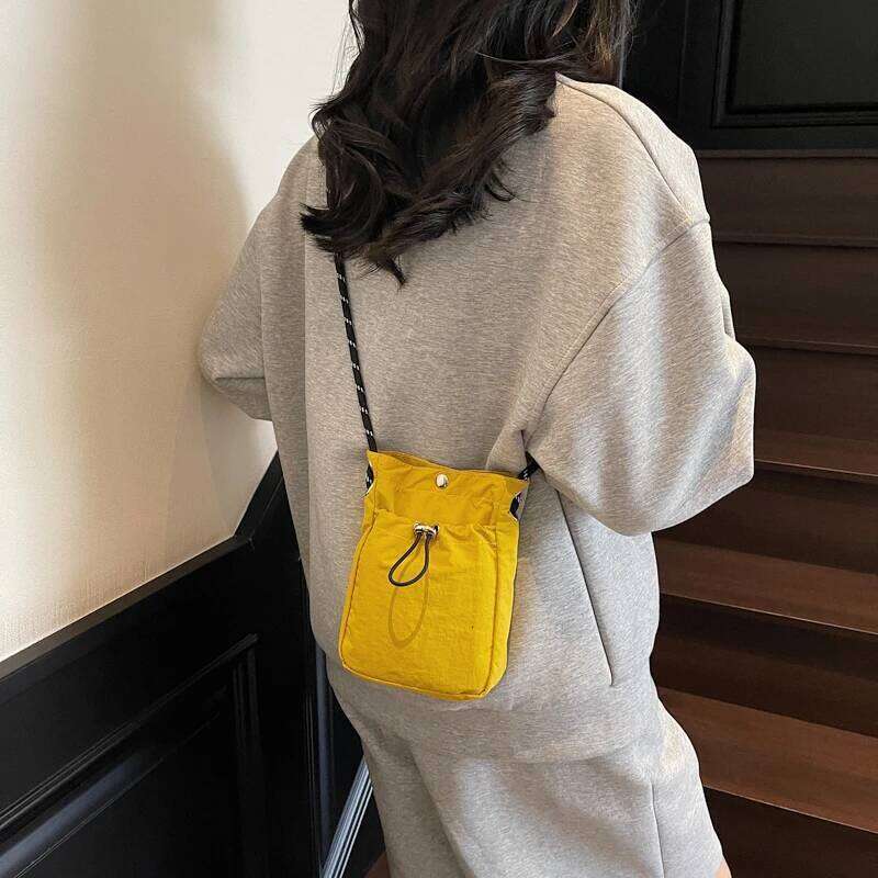 Minimalist Style Lightweight Drawstring Canvas Small Bag: Versatile Mini Single-Shoulder Crossbody Coin Purse for Mobile Phones