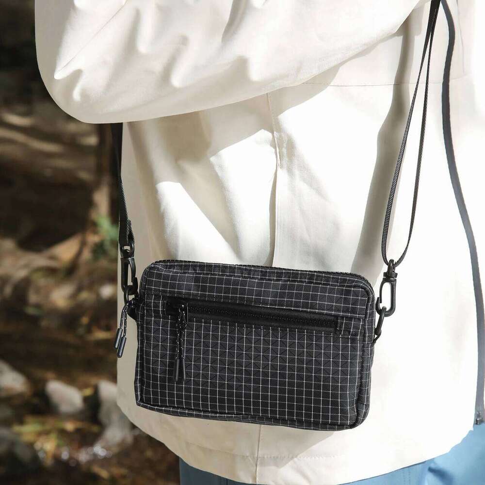 Women's casual shoulder and Hong Kong-style motorcycle bag, unisex plaid small crossbody bag.