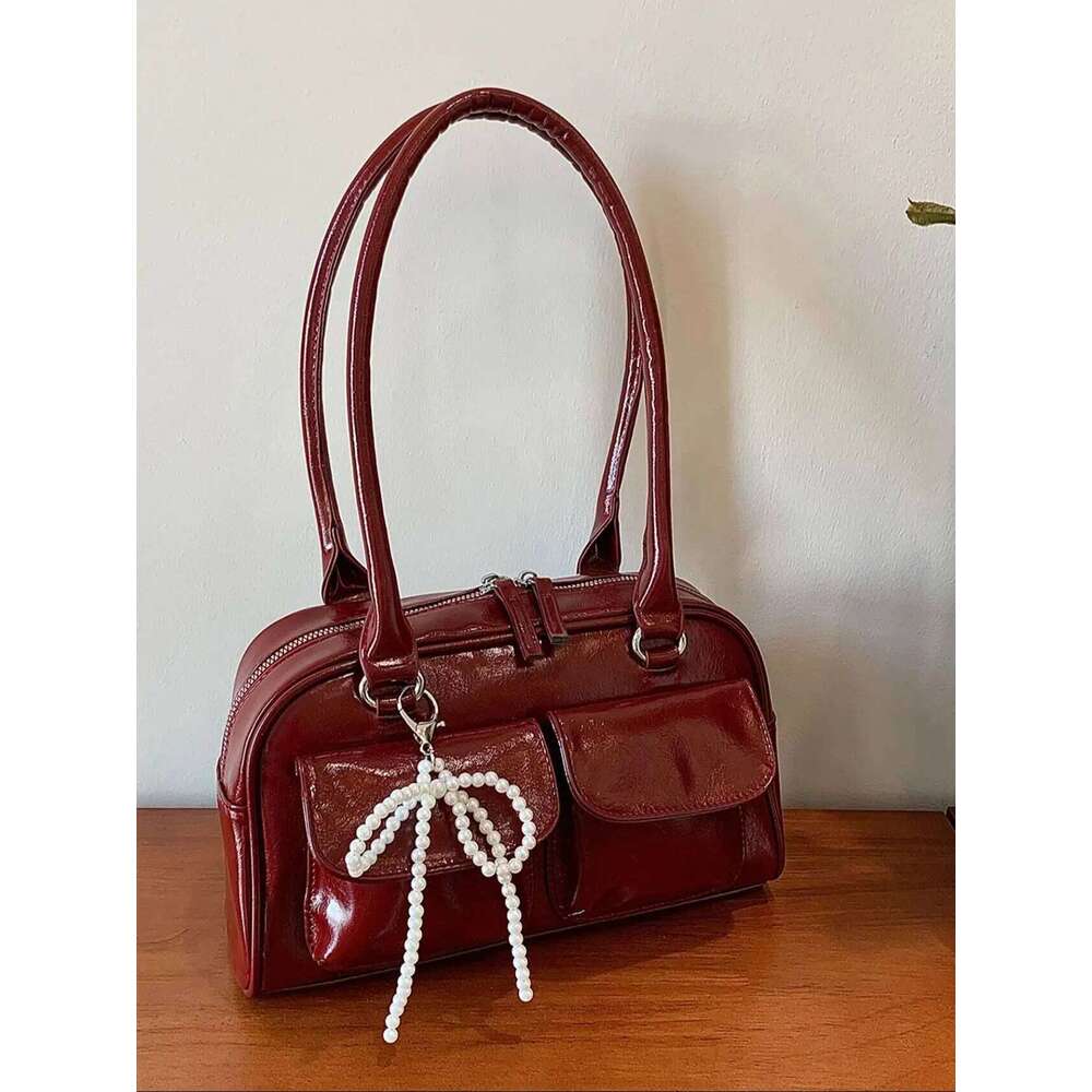 Simple casual bow tie armpit bag ladies, new Korean version for 2024; fashionable and versatile single shoulder bag.