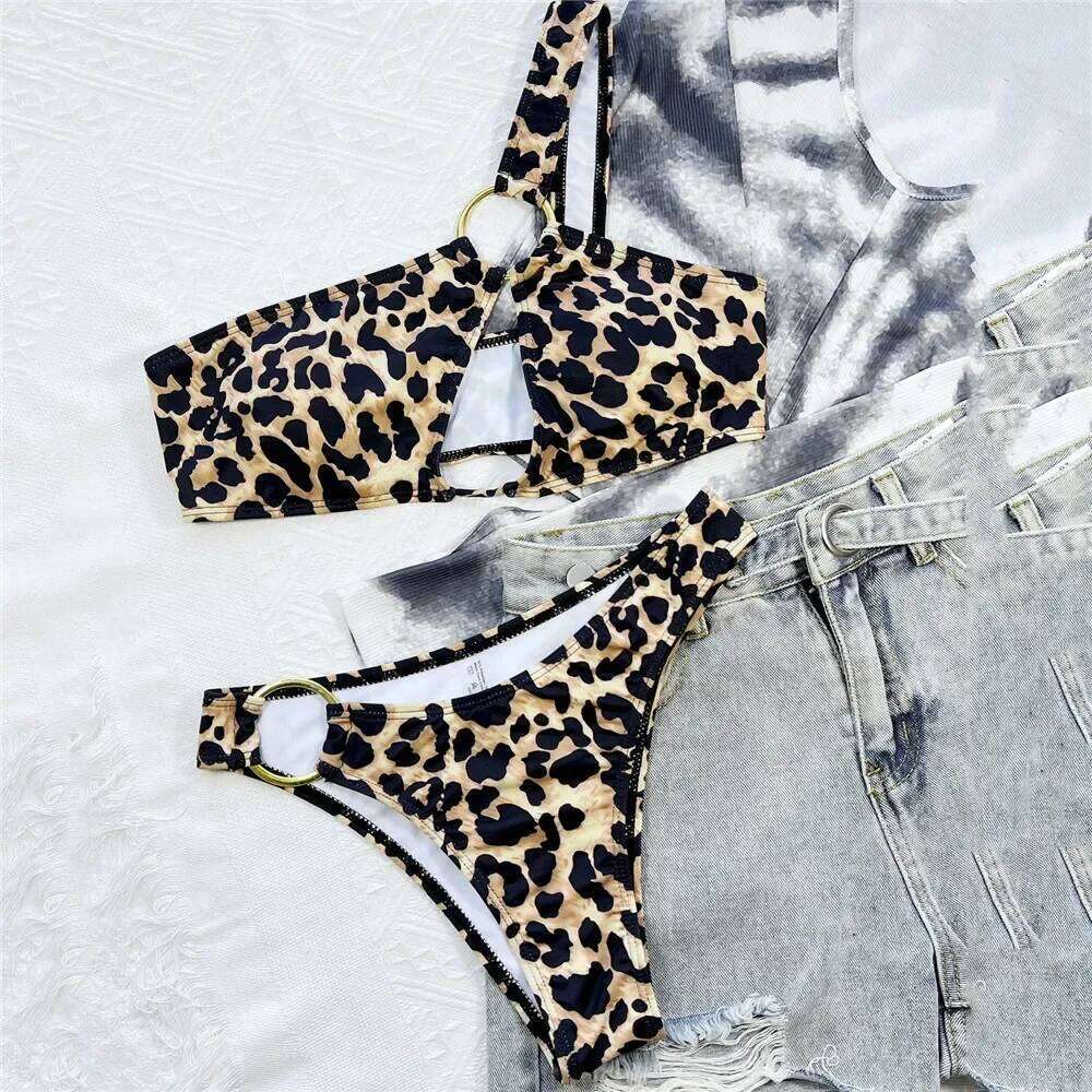 Sexy Hollow Out Swimsuit Leopard Print Micro Thong Bikinis Sets Women One Shoulder Swimwear 2026 Metal Ring Bikini Bathing Suit Z260301