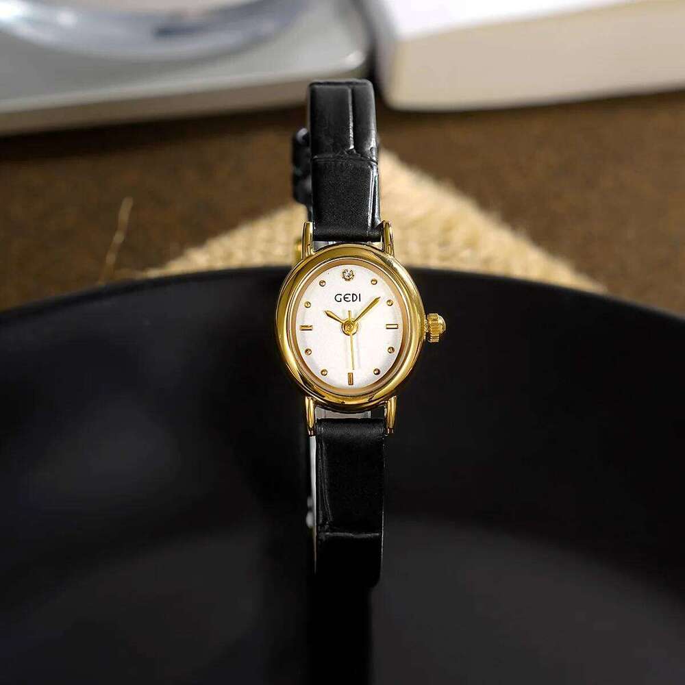 UTHAI 13103 CQ493 Light exquisite women's oval student style high aesthetic retro belt quartz clock gift H260228