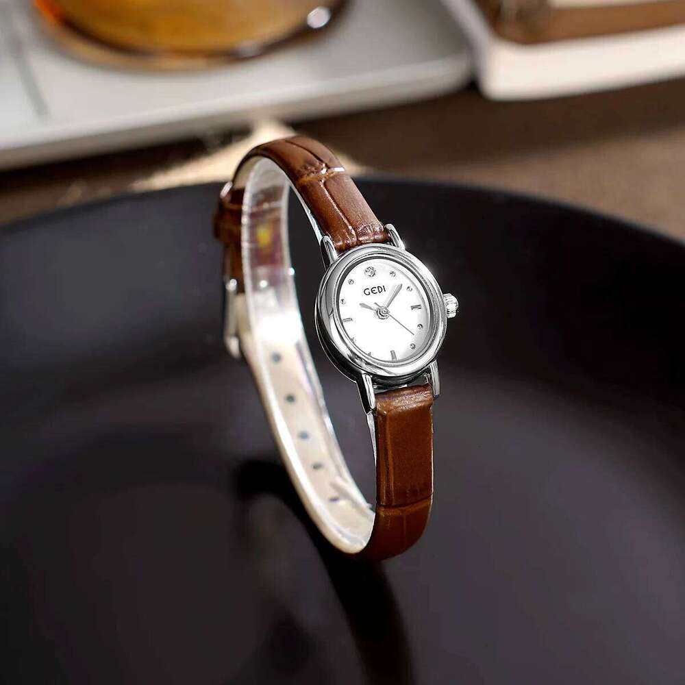 UTHAI 13103 CQ493 Light exquisite women's oval student style high aesthetic retro belt quartz clock gift H260228