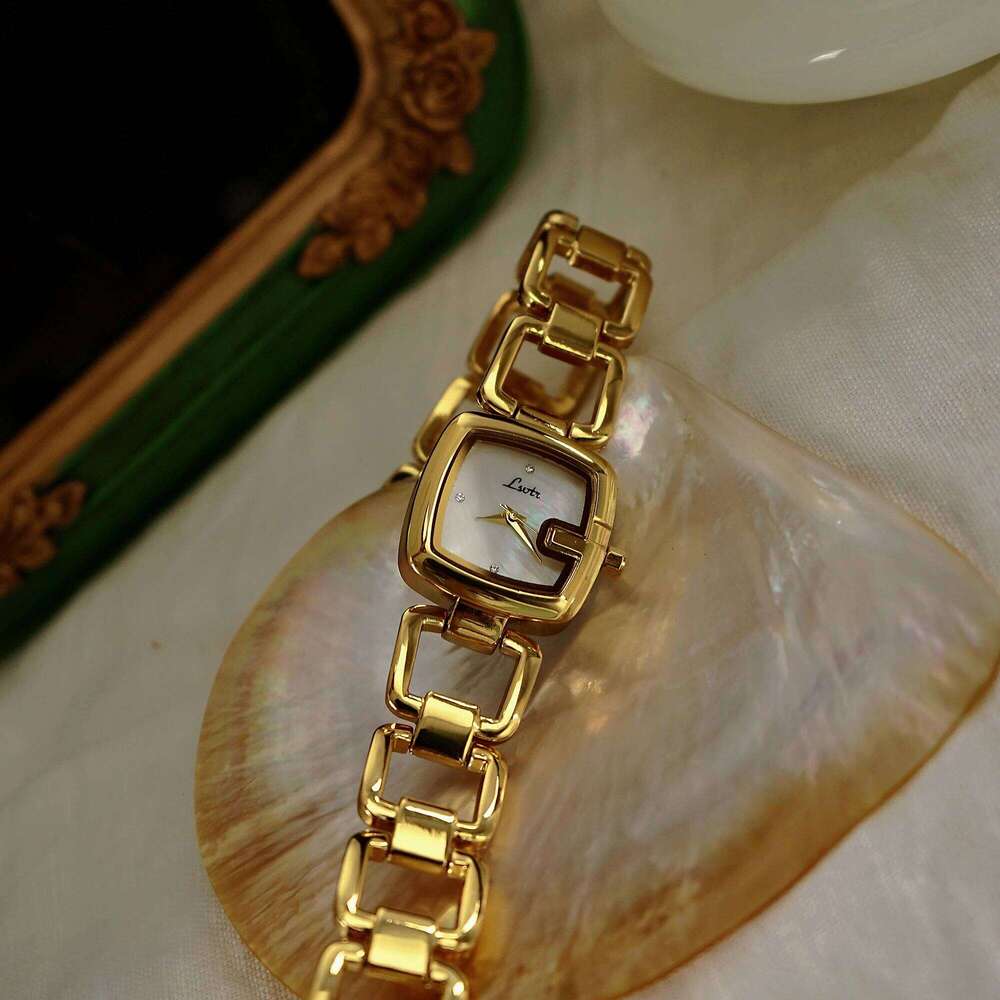 1pc Women's Elegant High-End Fashion Quartz , Stainless Steel Band, Rhinestone & Mother Of Pearl Dial, Hollow Design H260228