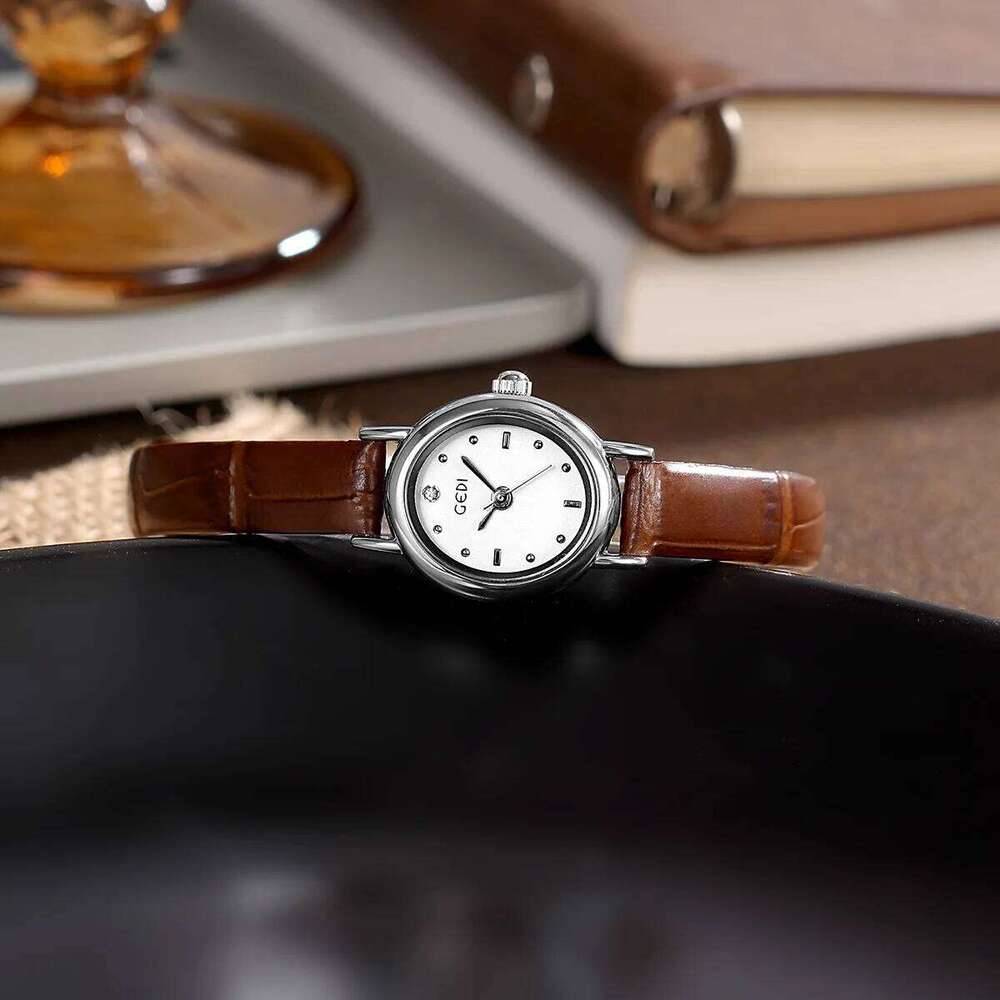 UTHAI 13103 CQ493 Light exquisite women's oval student style high aesthetic retro belt quartz clock gift H260228