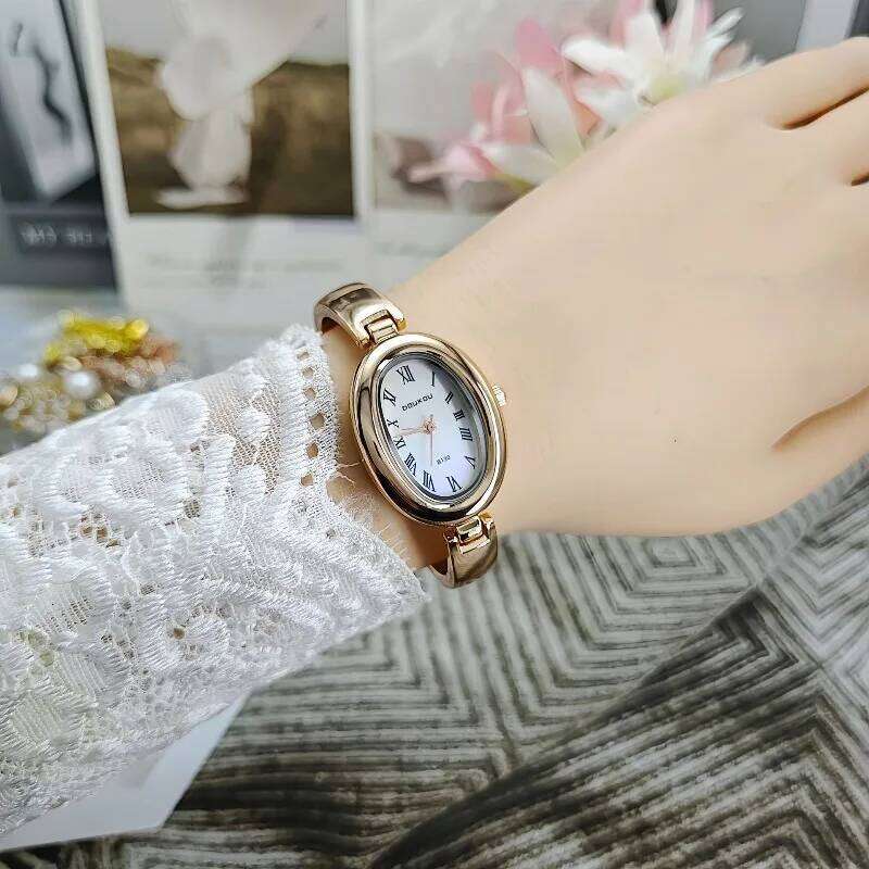 Luxury Famous Brand Women Oval Dial Quartz es Fashion Ladies Strap Wrist Relogio Montre Femme Dropshipping H260228