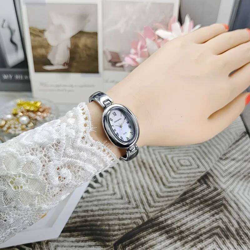 Luxury Famous Brand Women Oval Dial Quartz es Fashion Ladies Strap Wrist Relogio Montre Femme Dropshipping H260228