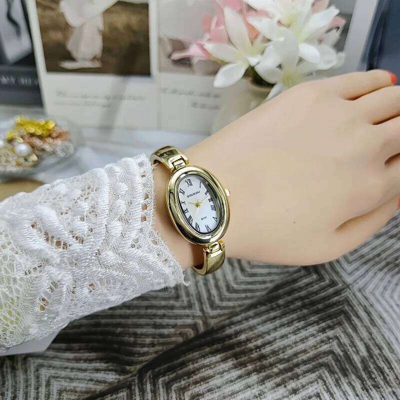 Luxury Famous Brand Women Oval Dial Quartz es Fashion Ladies Strap Wrist Relogio Montre Femme Dropshipping H260228