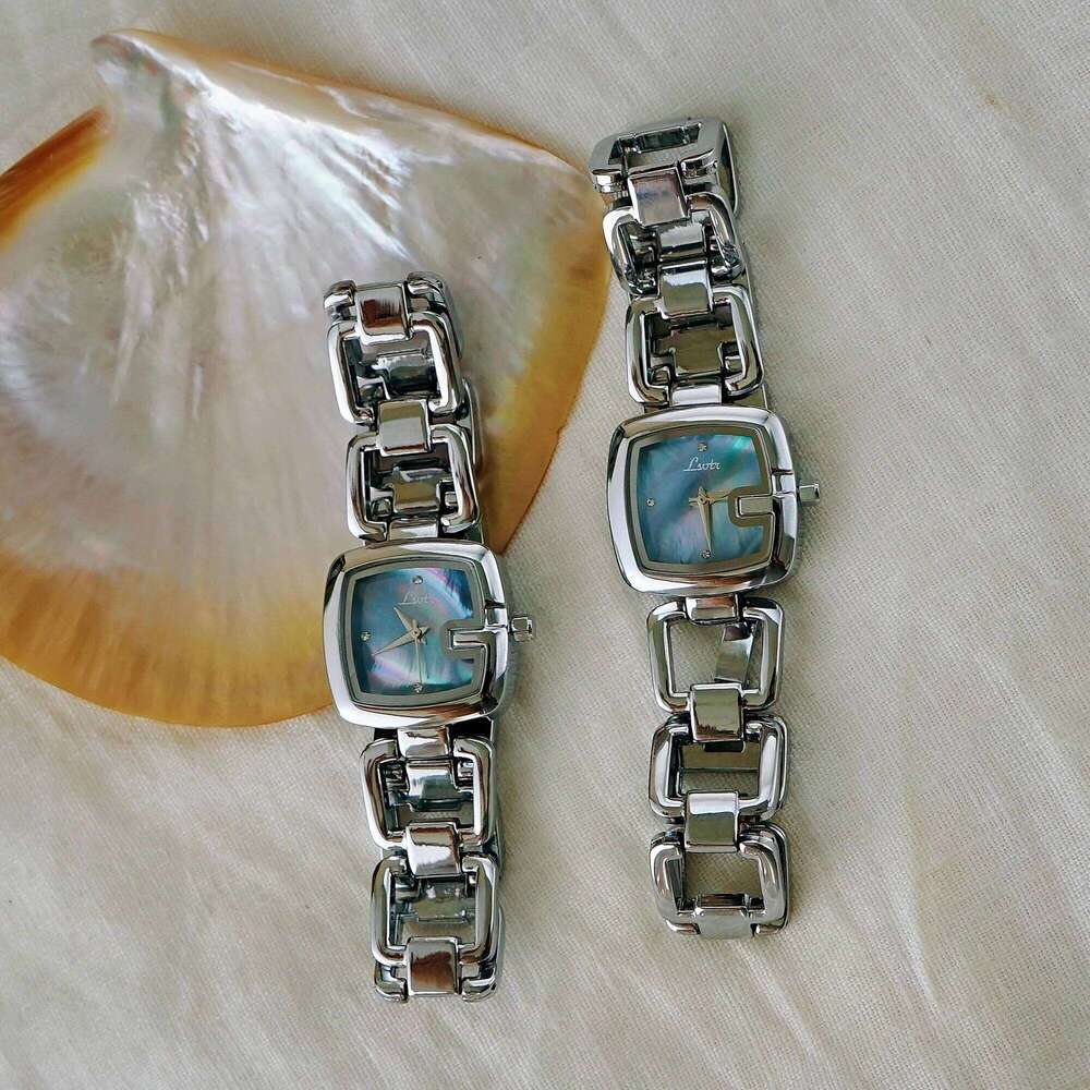 1pc Women's Elegant High-End Fashion Quartz , Stainless Steel Band, Rhinestone & Mother Of Pearl Dial, Hollow Design H260228