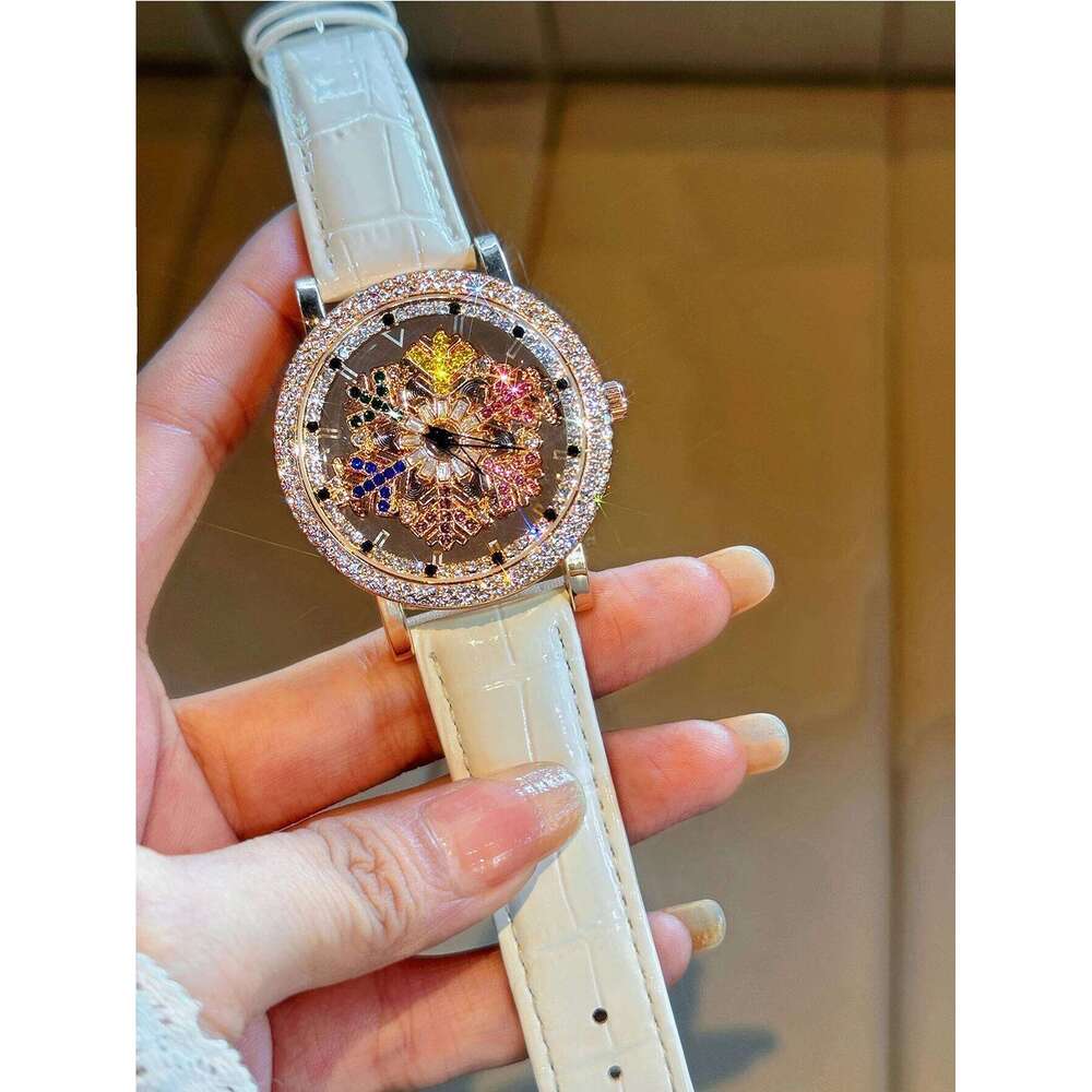 1 Upgraded Version of the Bright Eye-Catching Fashionable Inlaid Rhinestone Quartz Equipped with Charming Rotating Colorful Snowflake Dial, H260228