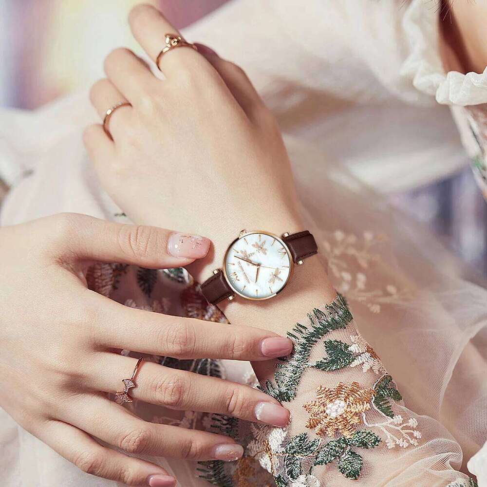 Hannah Martin Fashion Rose Gold Womens Japanese Quartz Movement Casual Leather Strap 3Bar Waterproof Dragonfly Women H260228