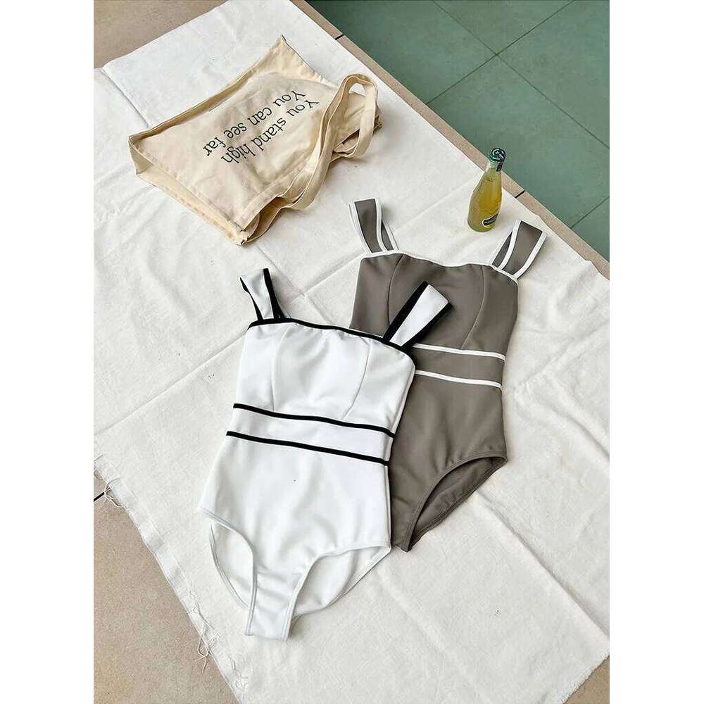 One Piece Swimsuit Featuring a Triangle Cut Halter Neck Tight Design and Slim Form Fitting Waist Cinching Swimsuits Z260301