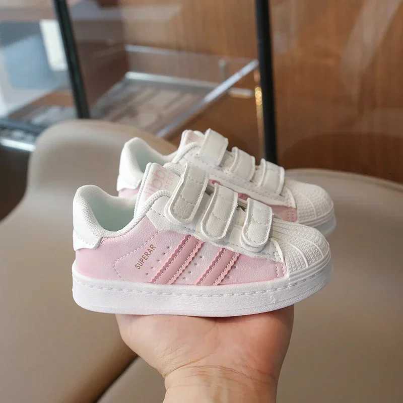 These Kids' Shell-toe Sneakers are stain-resistant, easy to clean, and perfect for active toddlers in spring, making them ideal for both play and