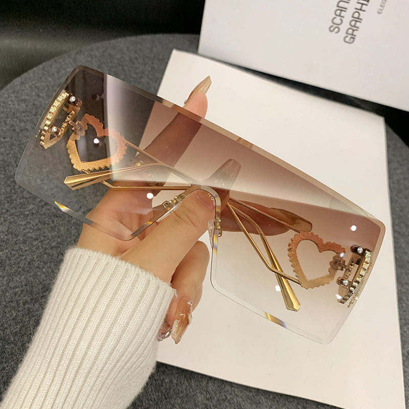 2026 New Designer Brand One-piece Heart-shaped Frameless Sunglasses Europe And America Y2K Internet Celebrity Style Fashion Sunglasses Cross-border