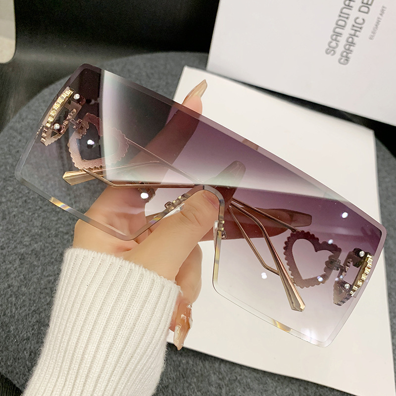 2026 New Designer Brand One-piece Heart-shaped Frameless Sunglasses Europe And America Y2K Internet Celebrity Style Fashion Sunglasses Cross-border