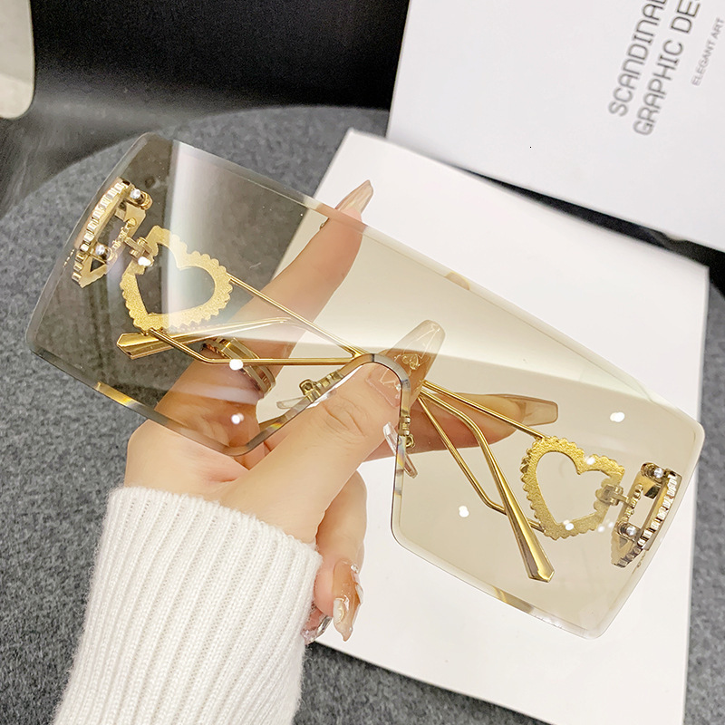 2026 New Designer Brand One-piece Heart-shaped Frameless Sunglasses Europe And America Y2K Internet Celebrity Style Fashion Sunglasses Cross-border
